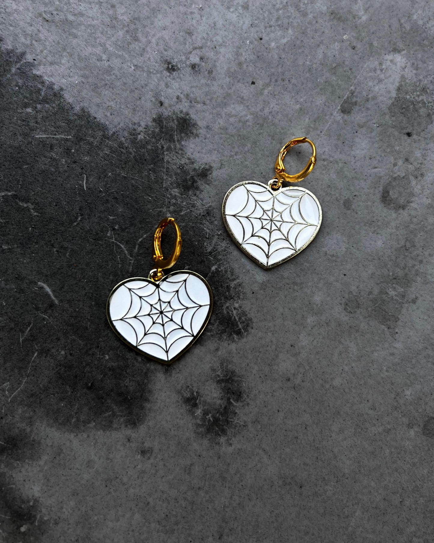 golden spiderwebs heart earrings