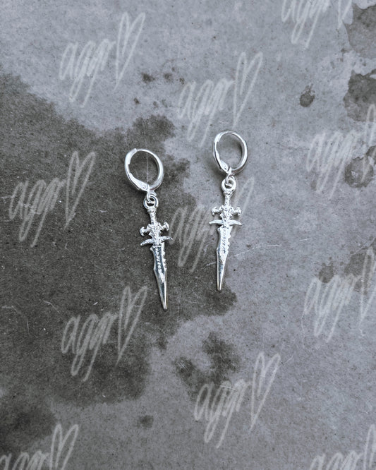 your dagger vs. my heart earrings