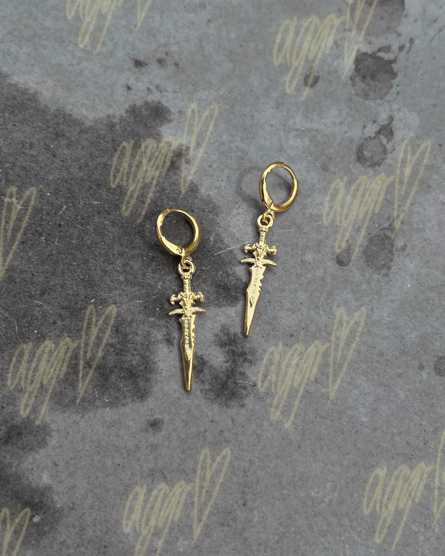 your dagger vs. my heart earrings