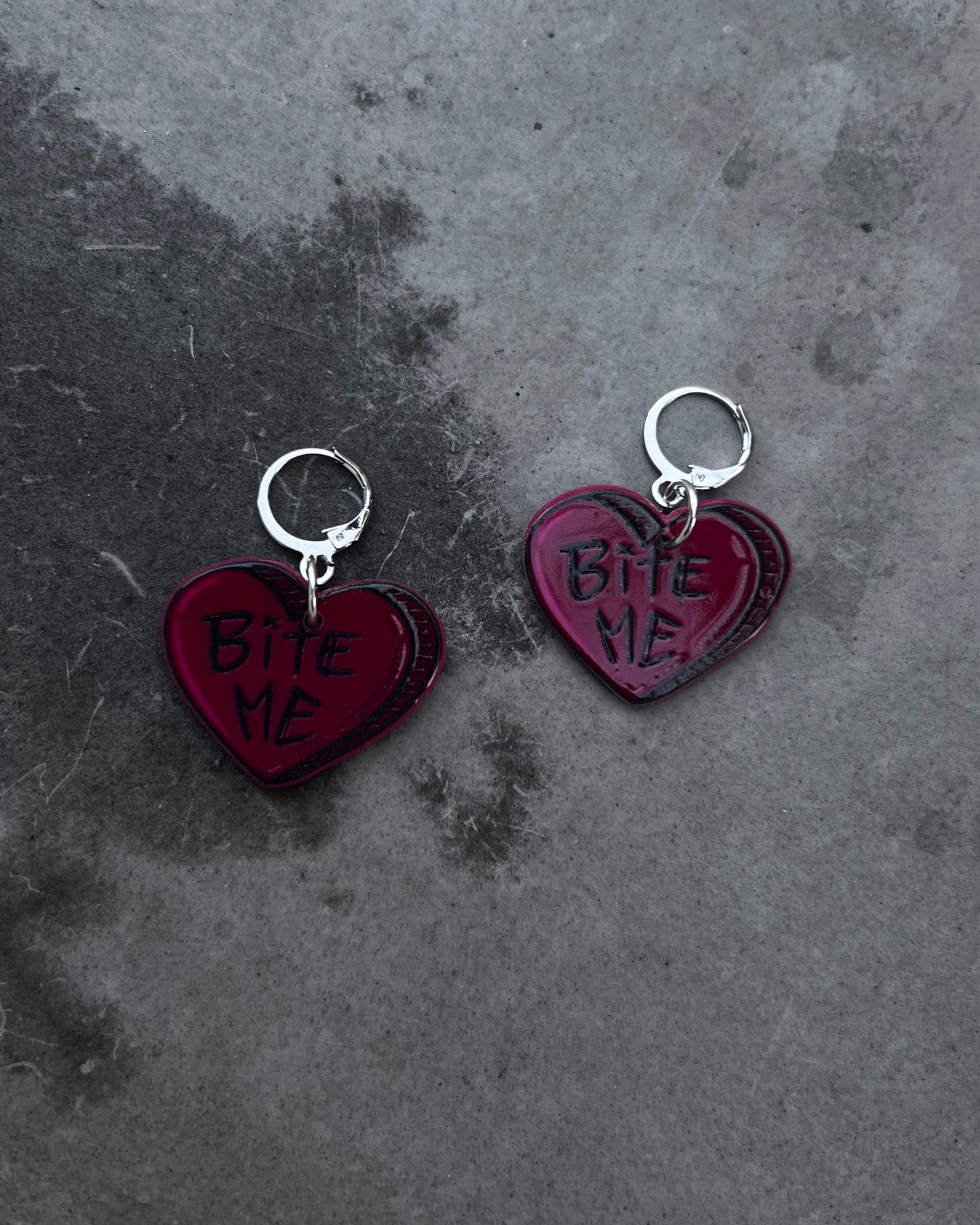 bite me hearts earrings