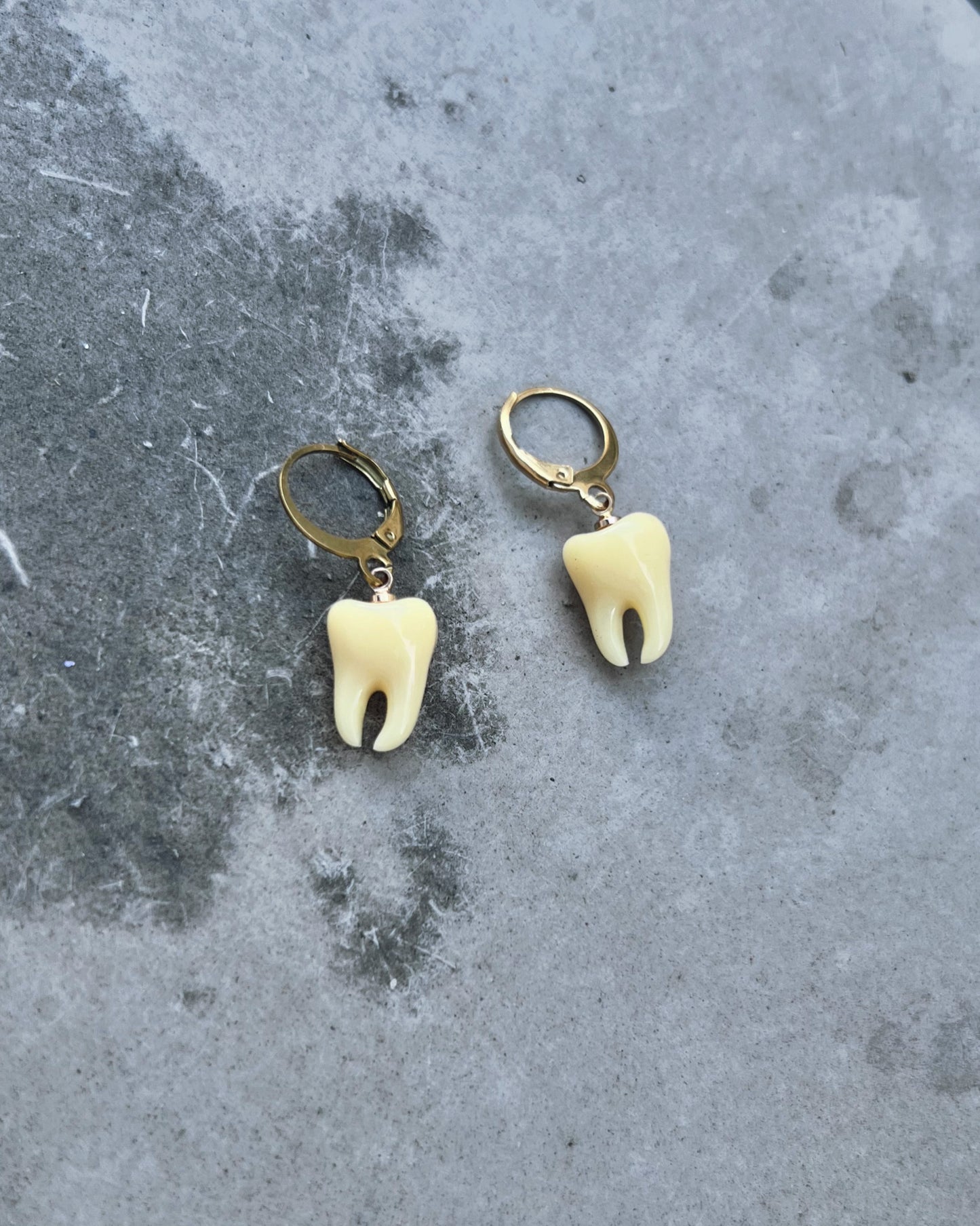 tooth chimera earrings