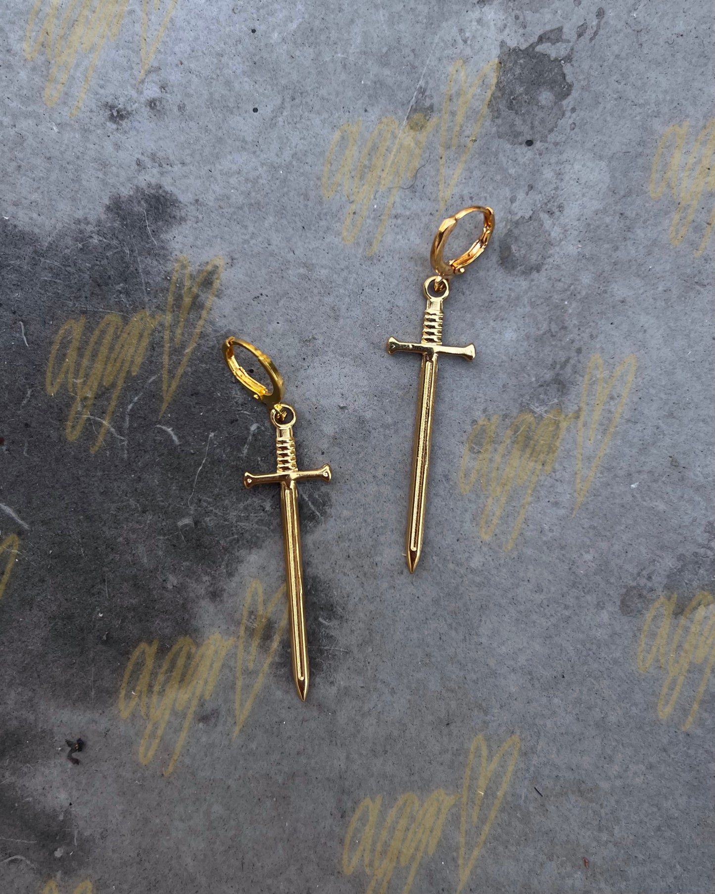 new poisonous swords earrings