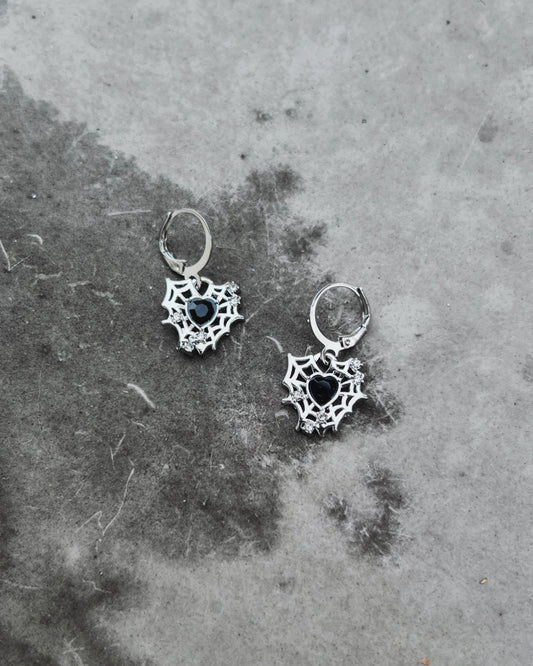 caught in the web crystal earrings