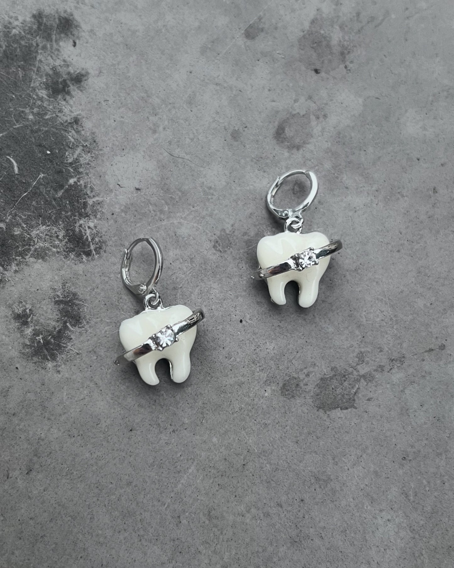 brace up for bling tooth earrings