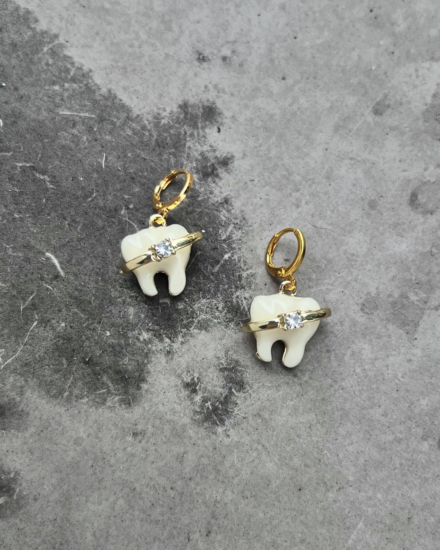 brace up for bling tooth earrings