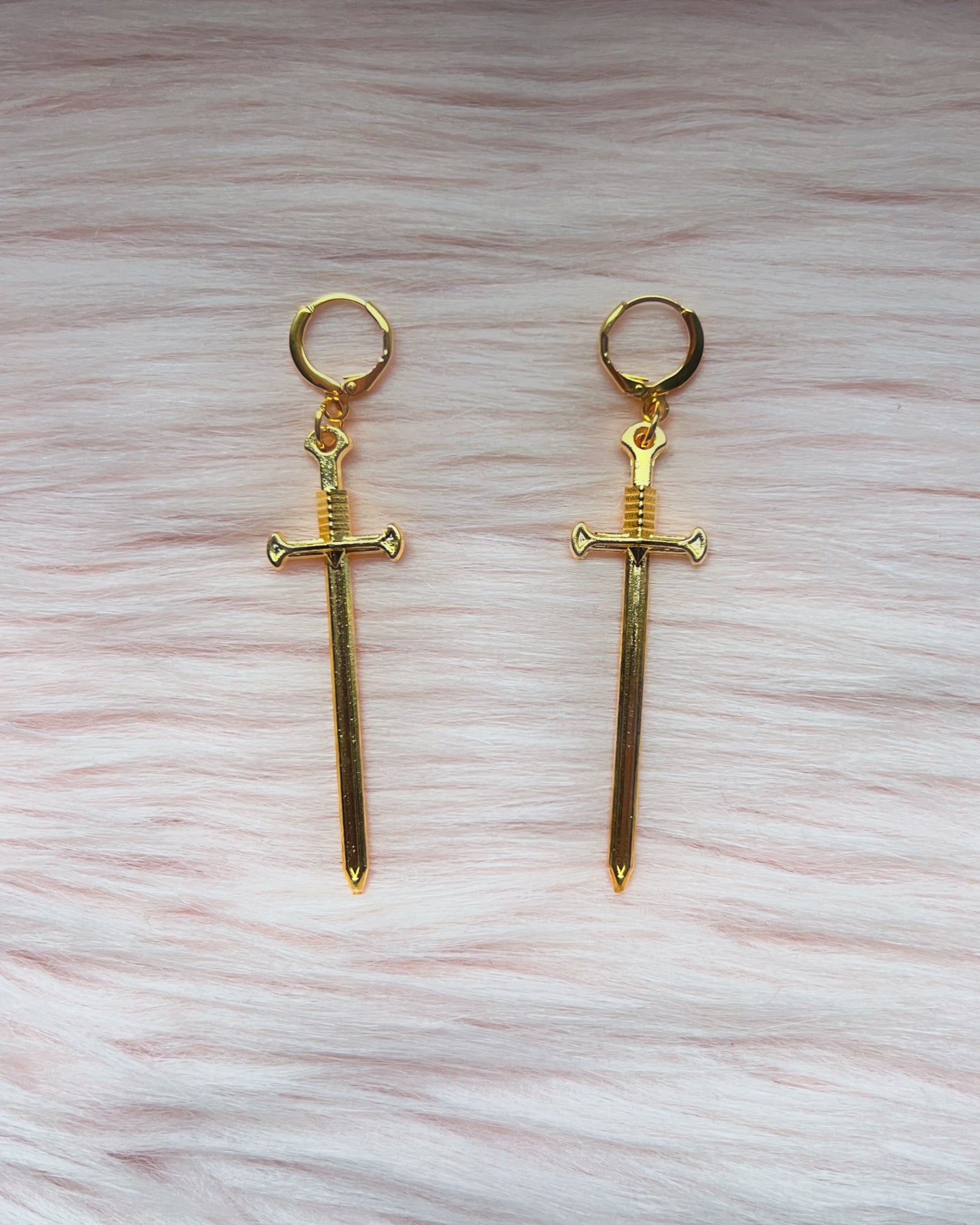 poisonous sword drop earrings