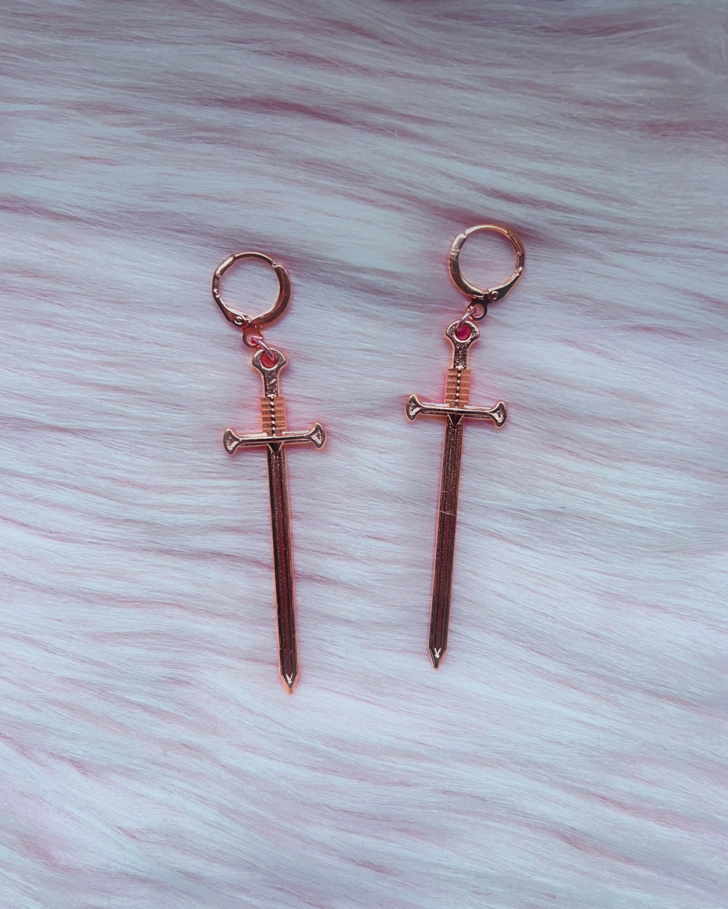 poisonous sword drop earrings